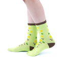 Person wearing long green Tabi Socks " Shika-no Ashiato ", right side view