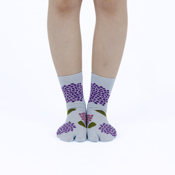 Person wearing long blue Tabi Socks " Ajisai ", front view