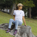 Black DISCO tabi shoes featuring a split-toe design and vibrant, multicolor pattern, shown worn for casual outdoor wear.