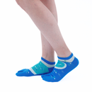 Person wearing short blue Tabi Socks " Enoshim ", right side view