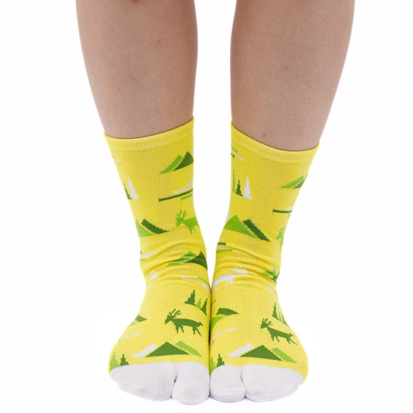 Person wearing long yelllow Tabi Socks " Mikasayama ", right side view