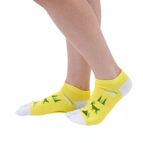 Person wearing long yellow Tabi Socks " Mikasayama ", front view