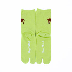 Back view of long green Tabi Socks " Pixel Shika "