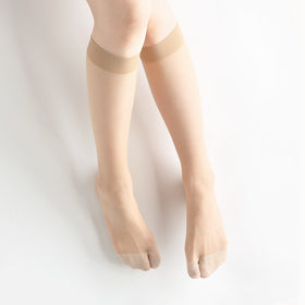 Person wearing Tabi-style stockings " ＆TABI ", right side view