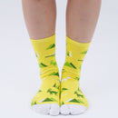 Person wearing long yelllow Tabi Socks " Mikasayama ", right side view