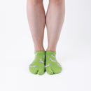 Person wearing short green Tabi Socks " Shika Hashiru ", front view