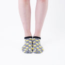 Person wearing short gray Tabi Socks " Beer ", front view